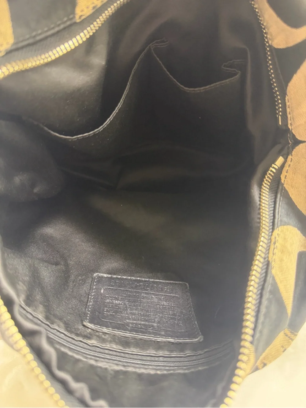 Coach iconic signature
